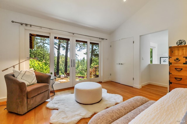 3 Wainwright Pl, Mill Valley, CA 94941 - living area with wood finished floors, vaulted ceiling, and baseboards