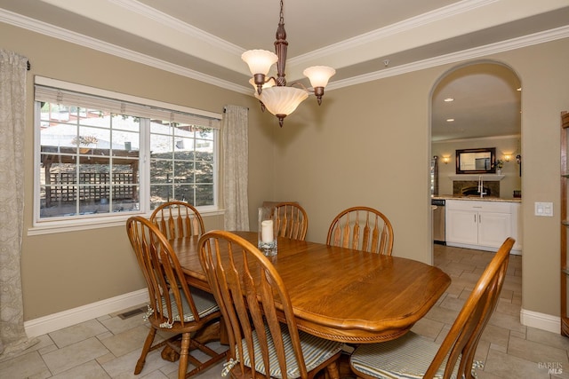 230 Clear Ridge Dr, Healdsburg, CA 95448 - dining area featuring crown molding, baseboards, stone tile floors, and a chandelier
