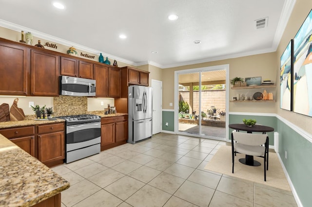 7437 Bloomsbury Way, Elk Grove, CA 95757 - kitchen with appliances with stainless steel finishes, light tile patterned floors, tasteful backsplash, light stone counters, and ornamental molding