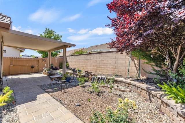 7437 Bloomsbury Way, Elk Grove, CA 95757 - fenced backyard featuring a patio