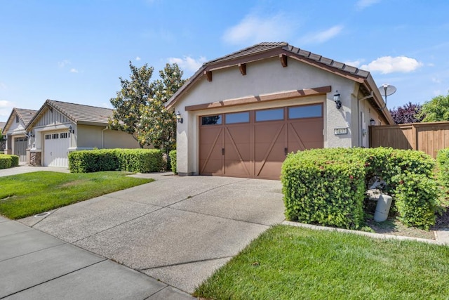 7437 Bloomsbury Way, Elk Grove, CA 95757 - view of front of house with stucco siding, concrete driveway, a tile roof, and a garage