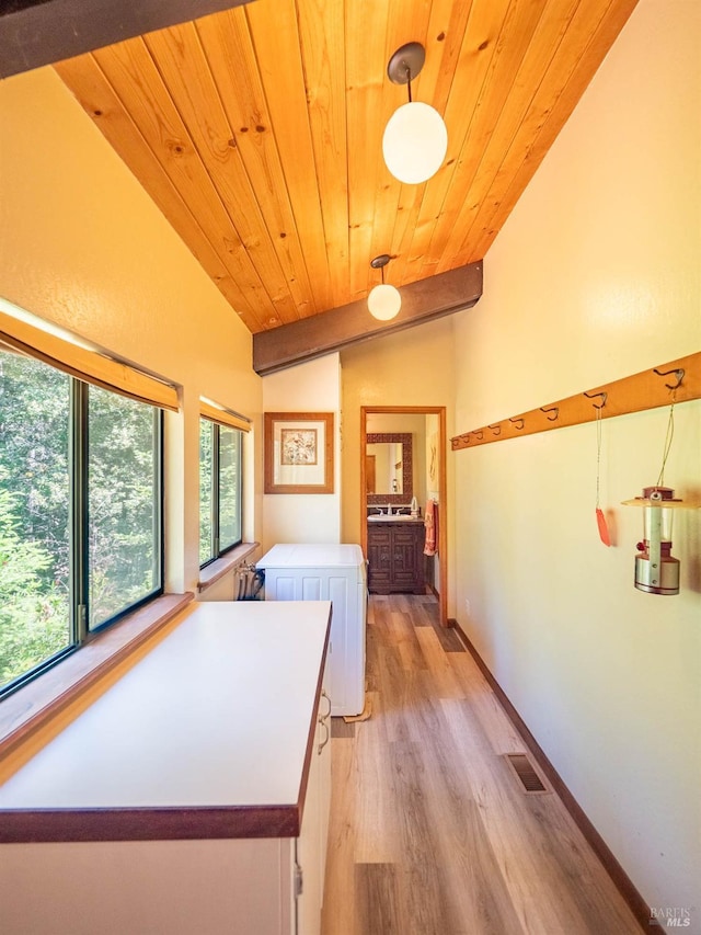 7701 Signal Ridge Rd, Philo, CA 95466 - corridor featuring light wood finished floors, wooden ceiling, and baseboards