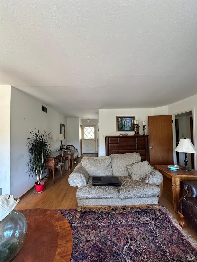 17 Sonora Way, Corte Madera, CA 94925 - living area featuring wood finished floors and a textured ceiling