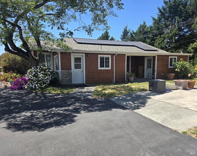 292 Palm Ave, Penngrove, CA 94951 - single story home with roof with shingles and roof mounted solar panels