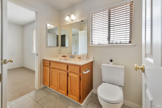 8046 Mason Dr, Rohnert Park, CA 94928 - bathroom featuring vanity, toilet, and baseboards