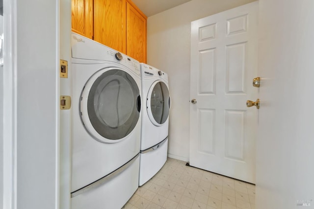 8046 Mason Dr, Rohnert Park, CA 94928 - washroom with cabinet space, washer and dryer, and light floors