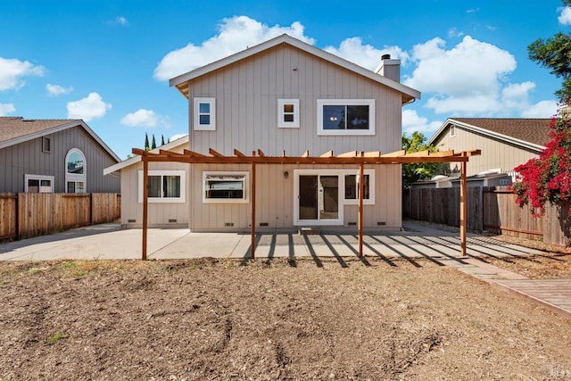 431 Inverness Way, Vacaville, CA 95687 - rear view of house featuring a patio area, a chimney, a pergola, a fenced backyard, and board and batten siding