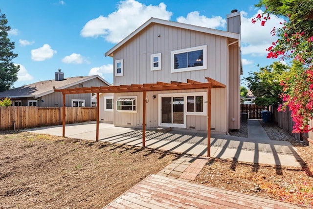 431 Inverness Way, Vacaville, CA 95687 - back of property with a patio, a pergola, a fenced backyard, board and batten siding, and a chimney