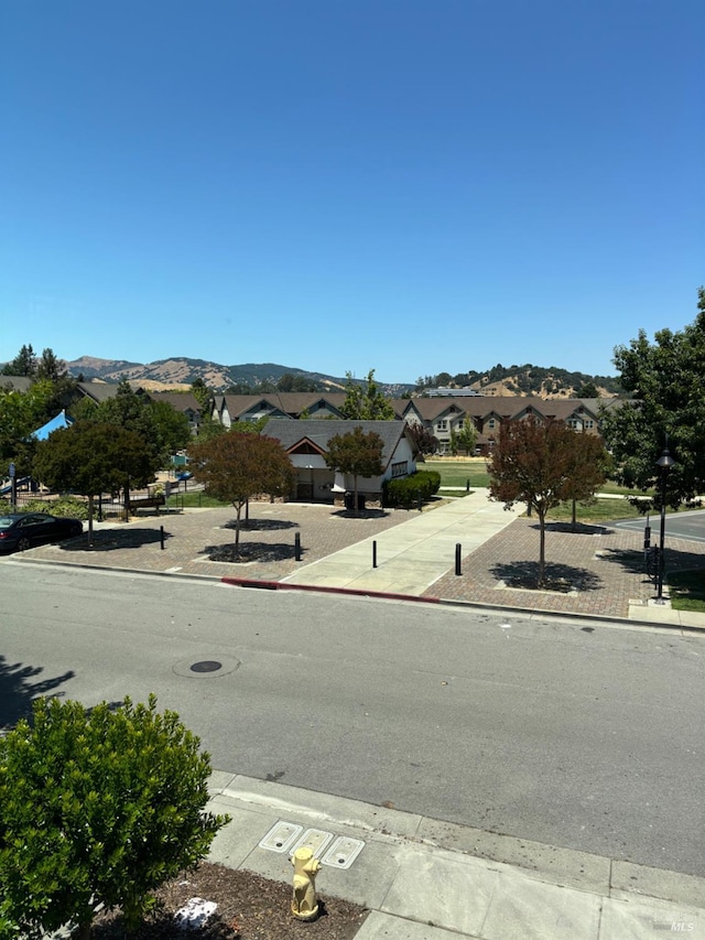 5 Sequoia Rd, San Rafael, CA 94903 - view of asphalt street featuring curbs, a residential view, street lights, sidewalks, and a mountain view