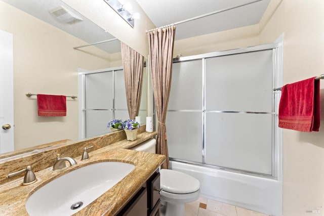 473 Mccall Dr, Benicia, CA 94510 - bathroom featuring toilet, vanity, combined bath / shower with glass door, and tile patterned floors
