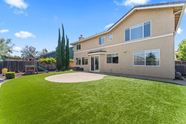 473 Mccall Dr, Benicia, CA 94510 - back of property with a playground, central AC unit, a patio, and stucco siding