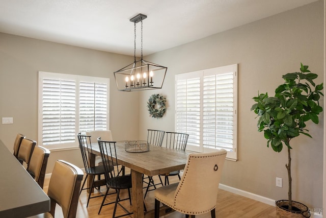 1238 Darling St, Napa, CA 94558 - dining space featuring healthy amount of natural light, light wood-style floors, and a chandelier