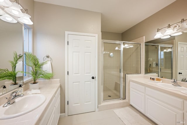 1238 Darling St, Napa, CA 94558 - bathroom with tile patterned floors, a stall shower, and two vanities