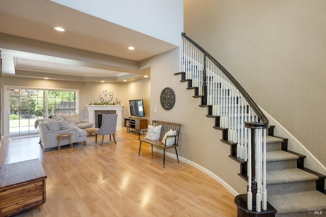 1238 Darling St, Napa, CA 94558 - staircase with wood finished floors, a fireplace, and recessed lighting