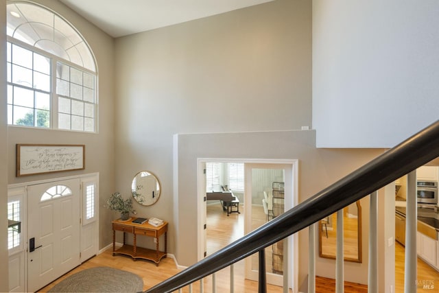 1238 Darling St, Napa, CA 94558 - entryway featuring stairs, a towering ceiling, and light wood finished floors