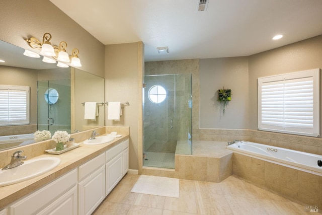 1238 Darling St, Napa, CA 94558 - full bathroom featuring a garden tub, double vanity, tile patterned floors, a shower stall, and recessed lighting