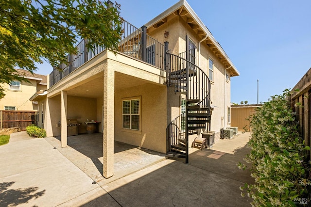 1238 Darling St, Napa, CA 94558 - rear view of house with stairs, stucco siding, and a patio area