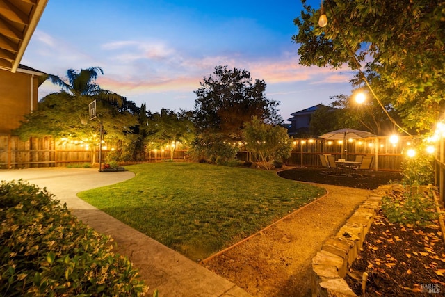 1238 Darling St, Napa, CA 94558 - yard at dusk featuring a fenced backyard and a patio area