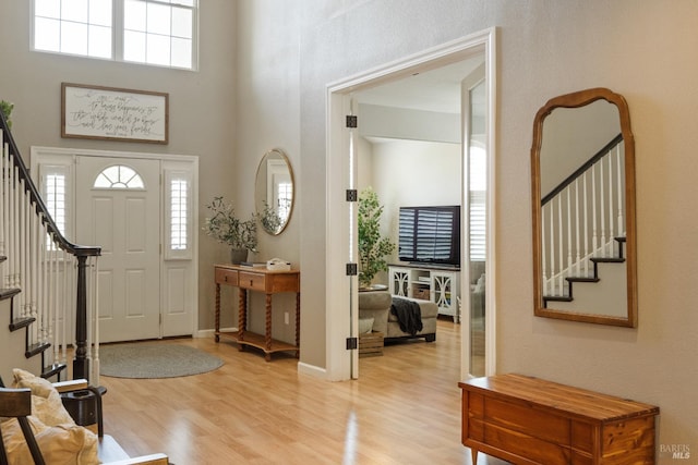 1238 Darling St, Napa, CA 94558 - entryway featuring stairway, light wood-style flooring, and a high ceiling