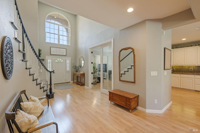 1238 Darling St, Napa, CA 94558 - foyer with stairs, light wood-type flooring, a towering ceiling, recessed lighting, and french doors