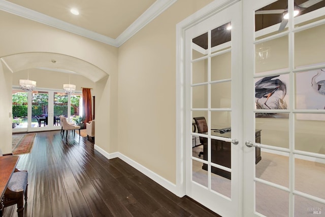 2986 Pebble Beach Cir, Fairfield, CA 94534 - hall featuring french doors, a chandelier, baseboards, dark wood-style floors, and arched walkways