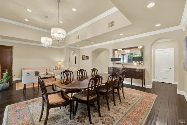 2986 Pebble Beach Cir, Fairfield, CA 94534 - dining area featuring arched walkways, dark wood-style floors, baseboards, crown molding, and recessed lighting