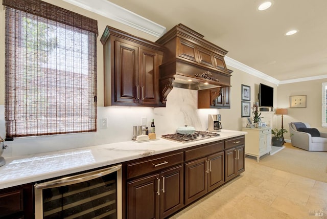 2986 Pebble Beach Cir, Fairfield, CA 94534 - kitchen featuring beverage cooler, stainless steel gas cooktop, ornamental molding, recessed lighting, and open floor plan