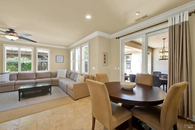 2986 Pebble Beach Cir, Fairfield, CA 94534 - dining space with ornamental molding, recessed lighting, a ceiling fan, and a chandelier