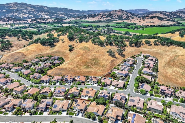 2986 Pebble Beach Cir, Fairfield, CA 94534 - aerial overview of property's location with a mountain backdrop and nearby suburban area