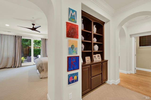 2986 Pebble Beach Cir, Fairfield, CA 94534 - corridor featuring arched walkways, ornamental molding, baseboards, and light wood-type flooring