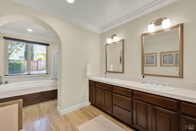 2986 Pebble Beach Cir, Fairfield, CA 94534 - full bath with a garden tub, double vanity, wood finished floors, ornamental molding, and baseboards