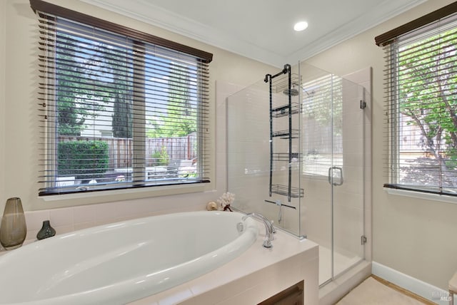 2986 Pebble Beach Cir, Fairfield, CA 94534 - bathroom with a stall shower, a bath, healthy amount of natural light, baseboards, and crown molding