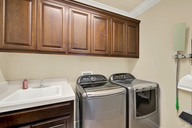 2986 Pebble Beach Cir, Fairfield, CA 94534 - washroom featuring washer and clothes dryer, cabinet space, and crown molding