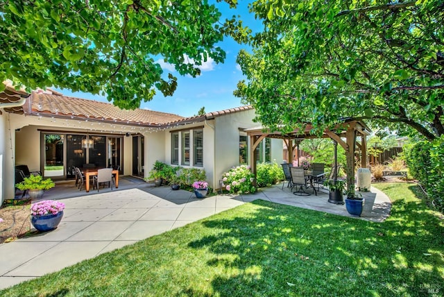 2986 Pebble Beach Cir, Fairfield, CA 94534 - rear view of house featuring a tiled roof, a patio, stucco siding, and outdoor dining area
