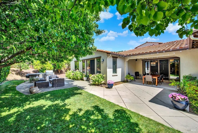 2986 Pebble Beach Cir, Fairfield, CA 94534 - back of property with stucco siding, a patio, a lawn, and a tile roof