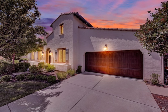 2986 Pebble Beach Cir, Fairfield, CA 94534 - mediterranean / spanish house featuring a garage, driveway, and stucco siding