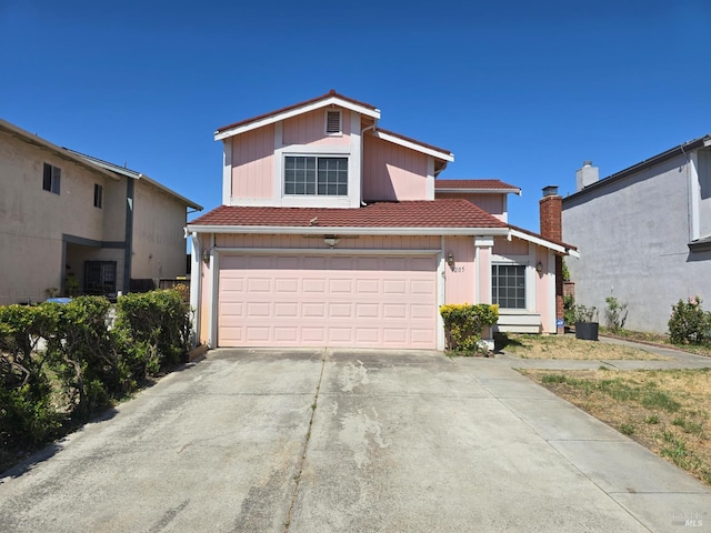 1205 Rosebriar Way, San Jose, CA 95131 - traditional-style home with driveway, a tile roof, a garage, and a chimney