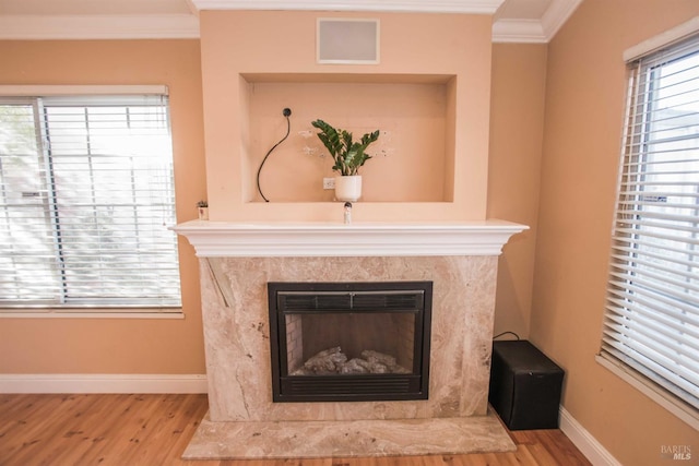 1205 Rosebriar Way, San Jose, CA 95131 - detailed view of crown molding, wood finished floors, and a fireplace