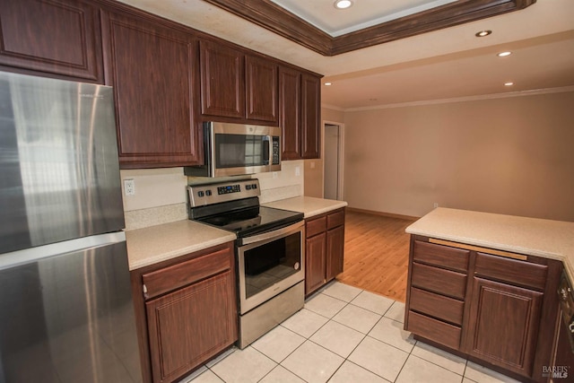1205 Rosebriar Way, San Jose, CA 95131 - kitchen with stainless steel appliances, crown molding, light countertops, recessed lighting, and light tile patterned floors