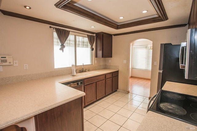 1205 Rosebriar Way, San Jose, CA 95131 - kitchen featuring ornamental molding, arched walkways, light countertops, electric stove, and a tray ceiling