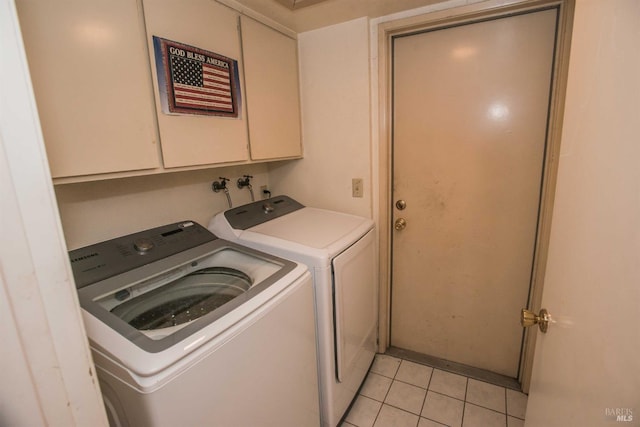 1205 Rosebriar Way, San Jose, CA 95131 - laundry area featuring washing machine and clothes dryer, light tile patterned flooring, and cabinet space