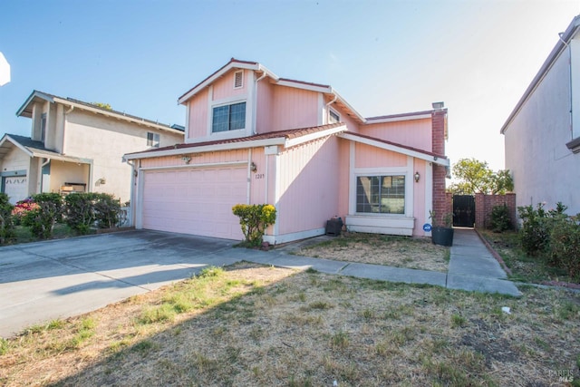 1205 Rosebriar Way, San Jose, CA 95131 - traditional-style house featuring a garage, driveway, and a chimney