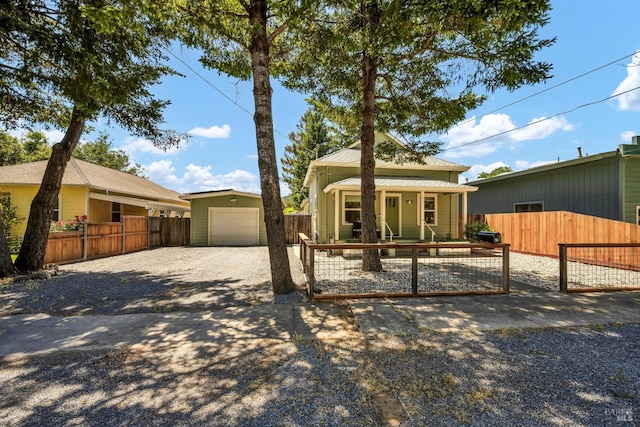 211 Mulberry St, Cloverdale, CA 95425 - view of front of property with a porch, an outbuilding, and driveway