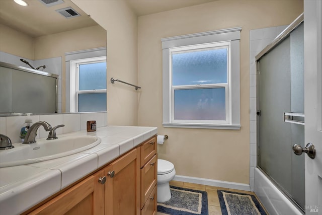 211 Mulberry St, Cloverdale, CA 95425 - bathroom with vanity, toilet, shower / bath combination with glass door, and baseboards