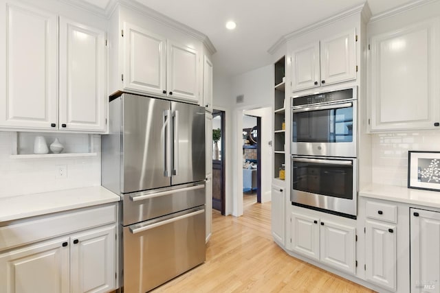 1572 Vista St, Oakland, CA 94602 - kitchen with stainless steel appliances, open shelves, white cabinets, and recessed lighting