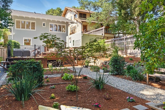 1572 Vista St, Oakland, CA 94602 - rear view of property with a garden, stucco siding, and a deck
