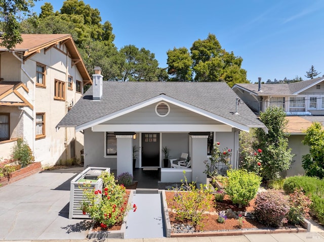1572 Vista St, Oakland, CA 94602 - view of front of property featuring a chimney, a shingled roof, and stucco siding