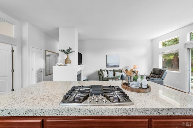 2832 Parkview Ter, Fairfield, CA 94534 - kitchen featuring stainless steel gas stovetop, open floor plan, and light stone countertops