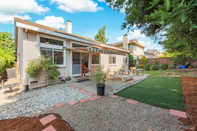 2832 Parkview Ter, Fairfield, CA 94534 - rear view of property with stucco siding, a patio area, and entry steps