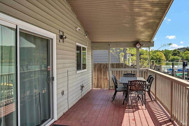 13201 Keys Blvd, Clearlake Oaks, CA 95423 - wooden terrace with outdoor dining area and a water view
